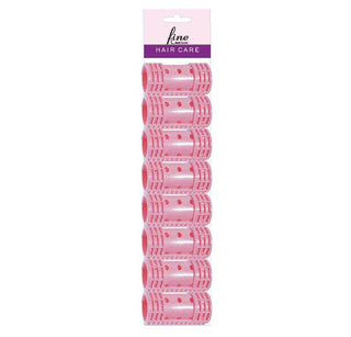 Set of pink hair rollers with packaging on a white background